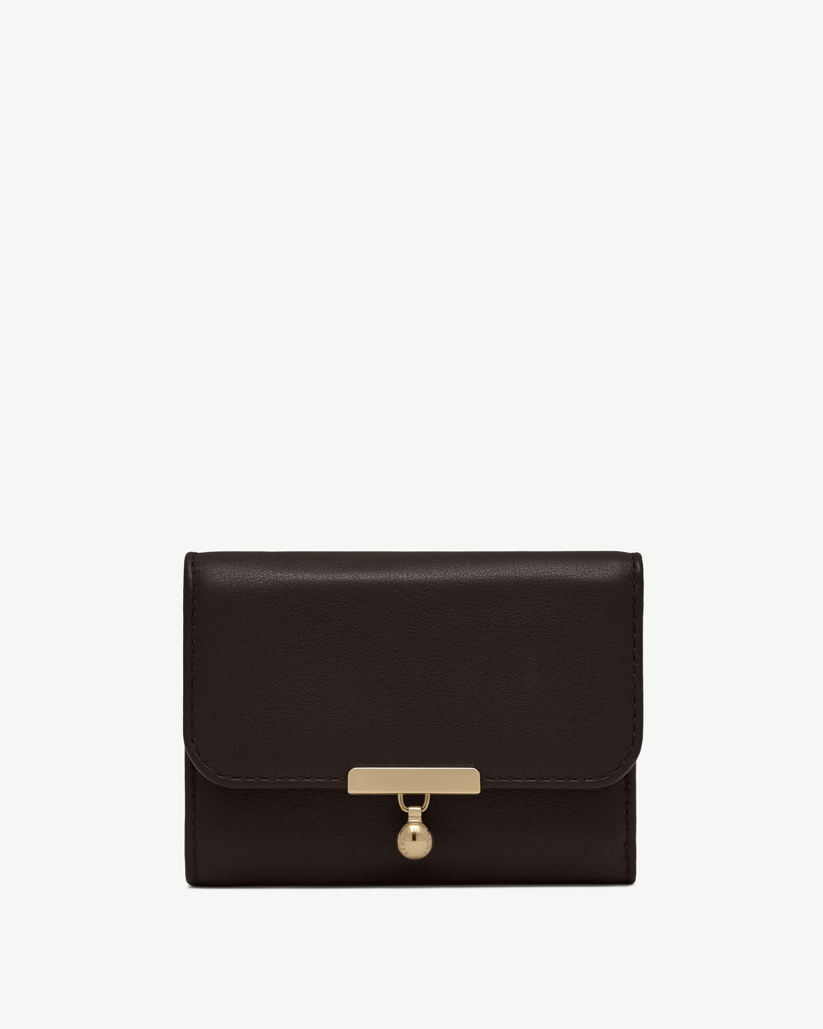 Espresso leather trifold wallet with gold bar clasp and charm on white background.